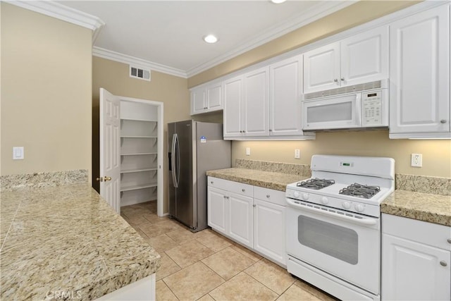 kitchen featuring white cabinetry, white appliances, ornamental molding, and light tile patterned floors