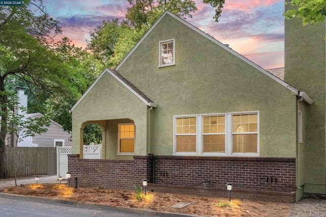 view of property exterior at dusk