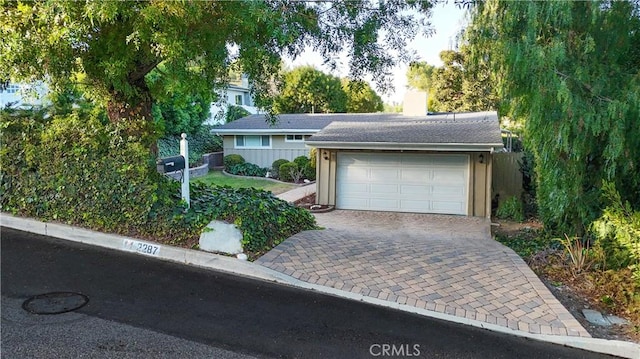 view of front of home featuring a garage