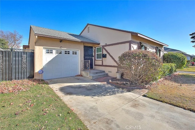 view of front of property with a garage