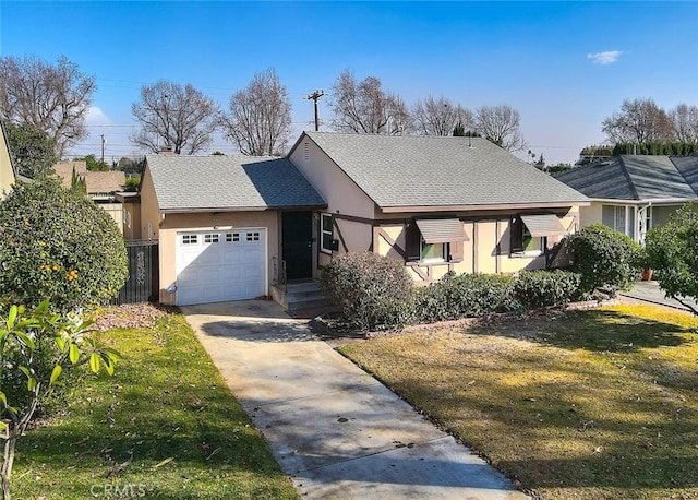 view of front of house with roof with shingles, stucco siding, an attached garage, driveway, and a front lawn