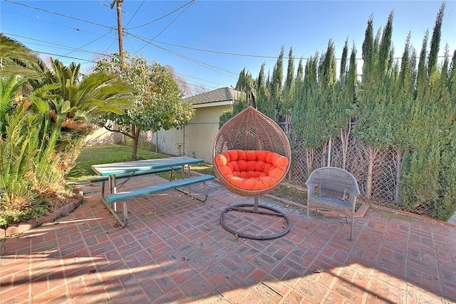 view of patio / terrace with fence