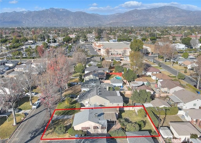 aerial view with a residential view and a mountain view