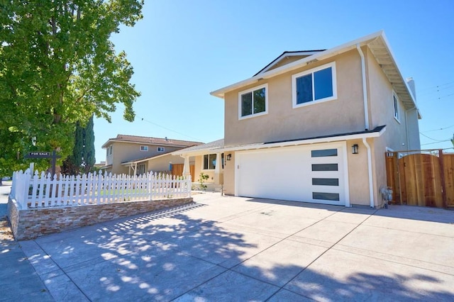 view of front of property featuring a garage