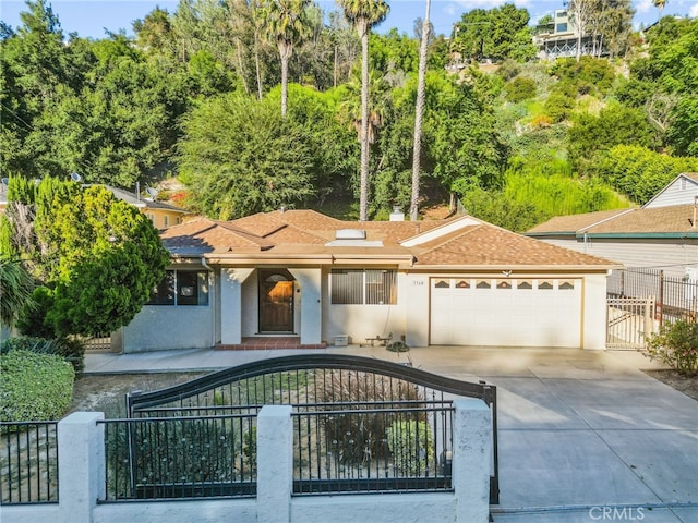 view of front of home with a garage