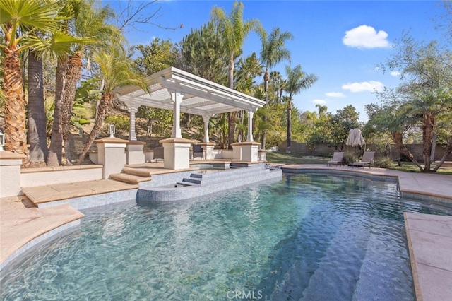 view of pool featuring a hot tub and a patio