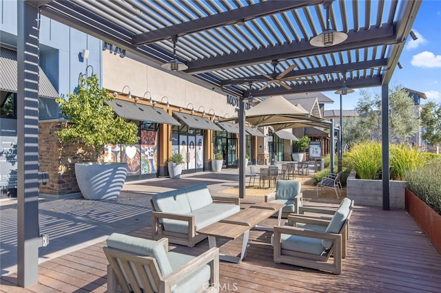 deck with outdoor lounge area and a pergola