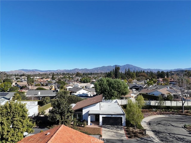 bird's eye view with a mountain view