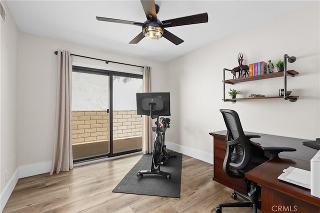 office featuring ceiling fan and light hardwood / wood-style floors