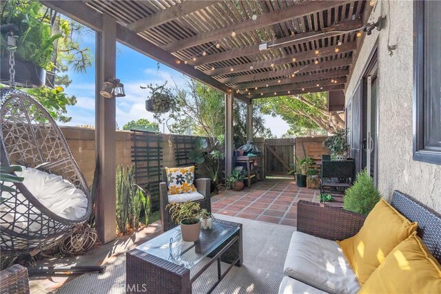 view of patio / terrace featuring an outdoor hangout area and a pergola