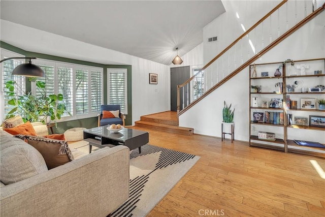 living room with light hardwood / wood-style flooring