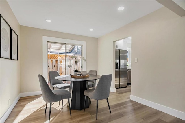 dining room featuring light hardwood / wood-style floors