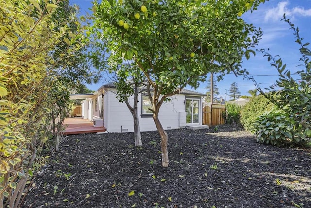 view of home's exterior with a deck