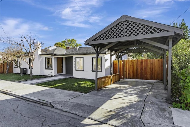 exterior space featuring a carport