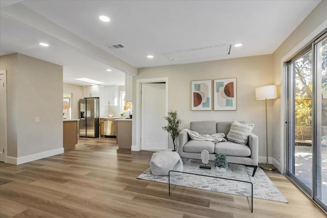 living room featuring light wood-type flooring