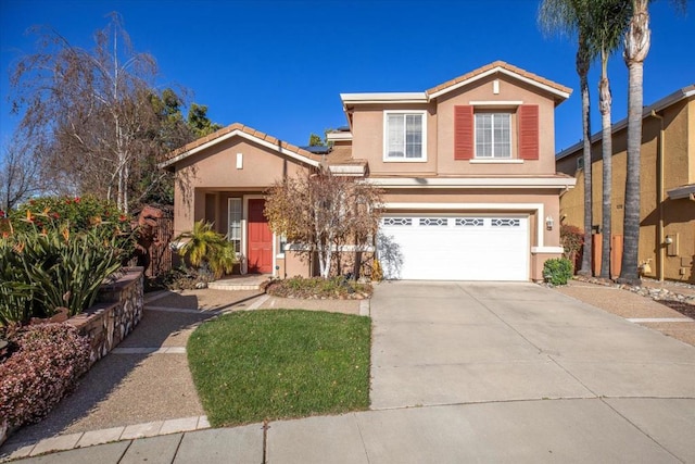 front of property with a garage