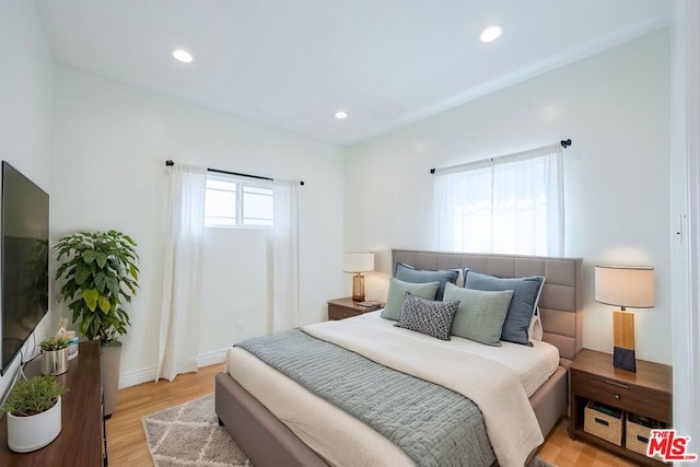 bedroom featuring light hardwood / wood-style floors