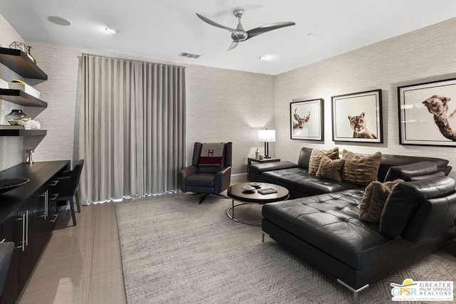 living room with ceiling fan