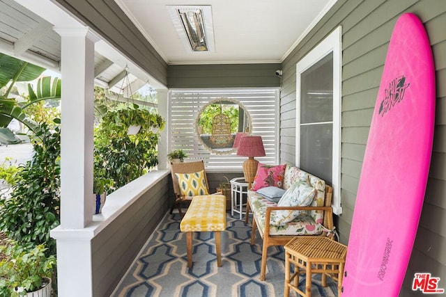 balcony featuring a porch