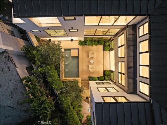 doorway to property featuring a patio area