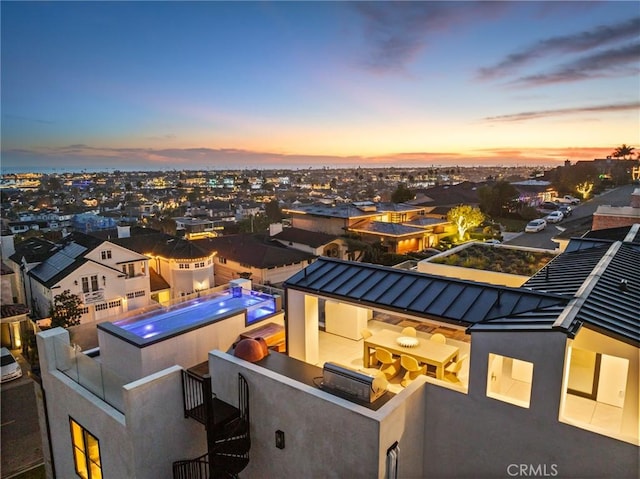 view of aerial view at dusk