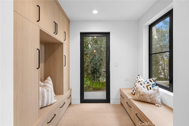 mudroom with recessed lighting and light wood-style flooring