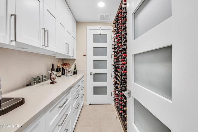 wine room featuring light tile patterned flooring