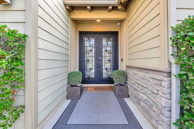 property entrance with french doors