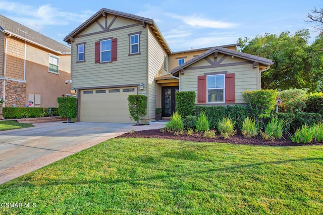 view of front of home with a front lawn and a garage