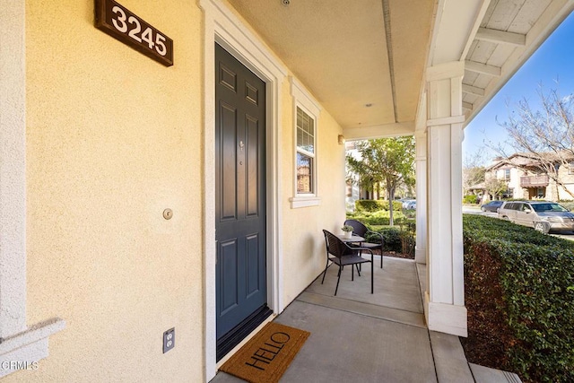 entrance to property with a porch