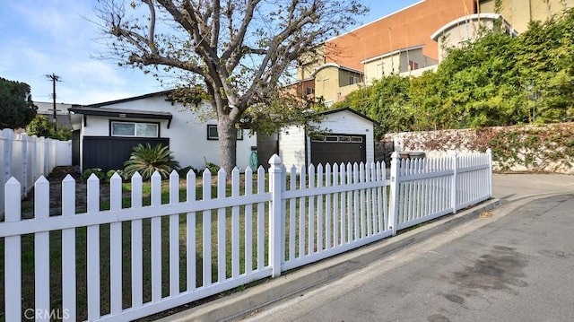 view of front of house featuring an outbuilding and a garage