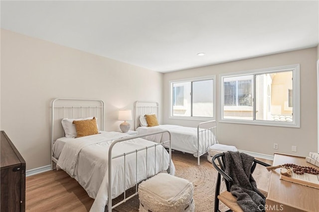 bedroom featuring light hardwood / wood-style floors