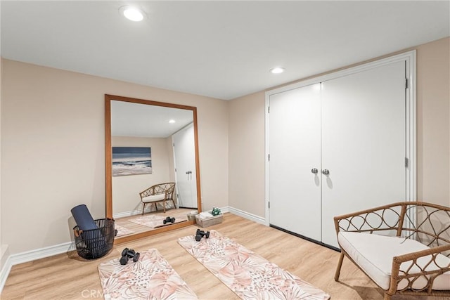 sitting room with light hardwood / wood-style flooring