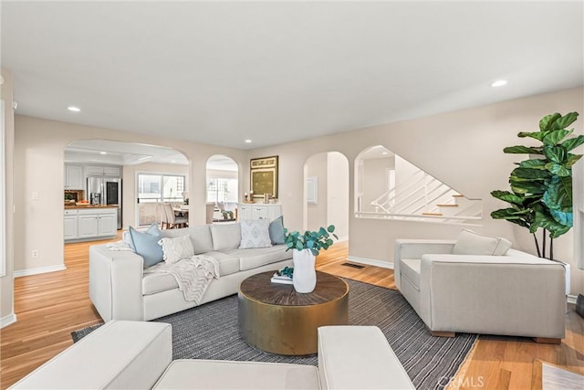 living room with light hardwood / wood-style floors