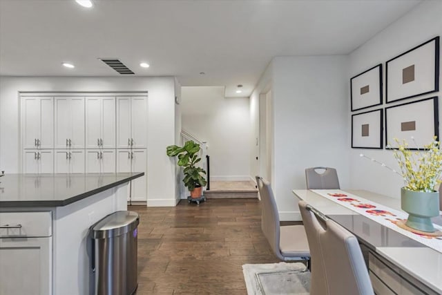 interior space with dark wood-type flooring