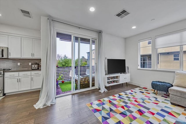 living room with dark wood-type flooring