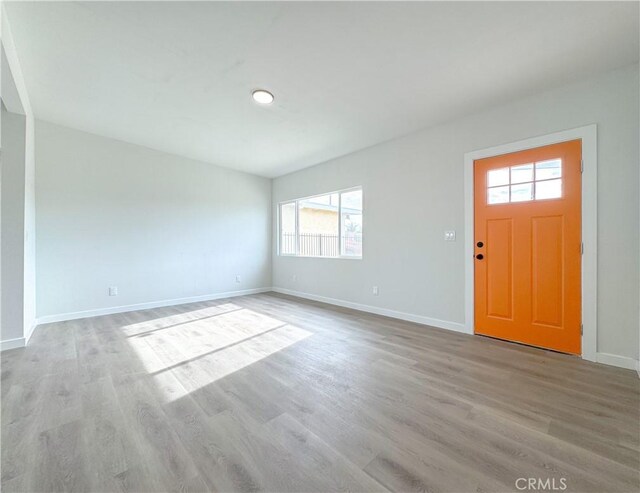 foyer with light hardwood / wood-style floors