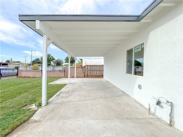 view of patio / terrace with a carport