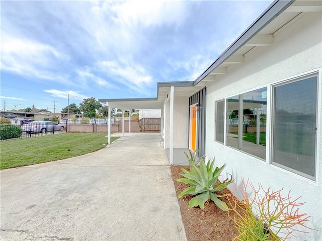 view of patio featuring a carport