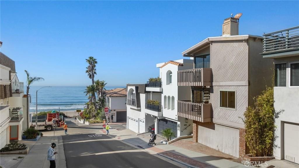 view of street featuring a water view