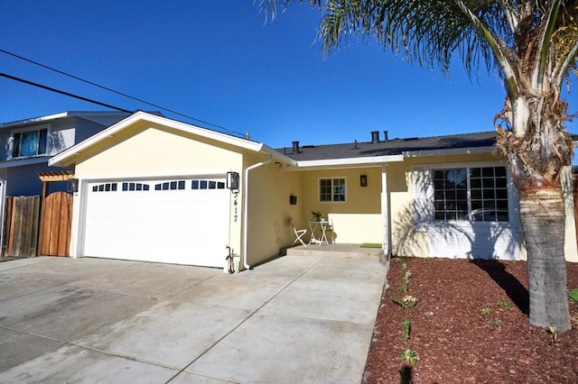 single story home featuring a garage