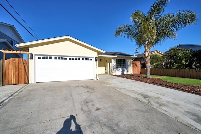 single story home with a garage