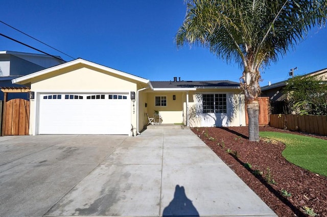 ranch-style house featuring a garage