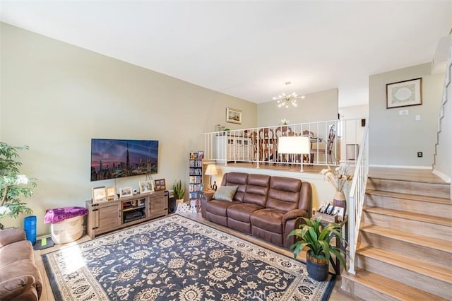 living room featuring an inviting chandelier