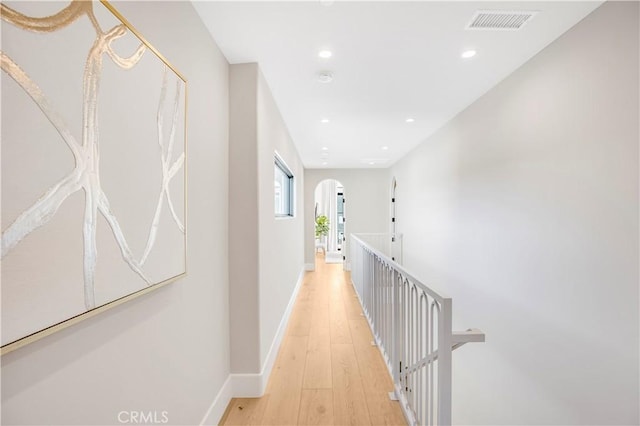 corridor featuring light hardwood / wood-style flooring