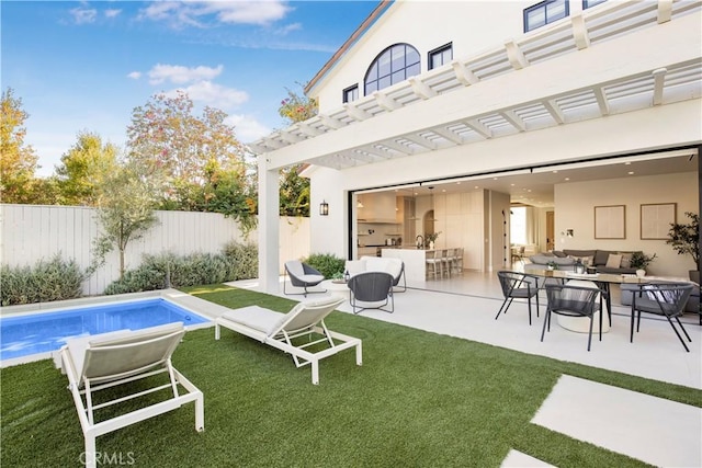 exterior space with a fenced in pool and a pergola