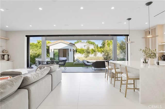 living room with light tile patterned floors