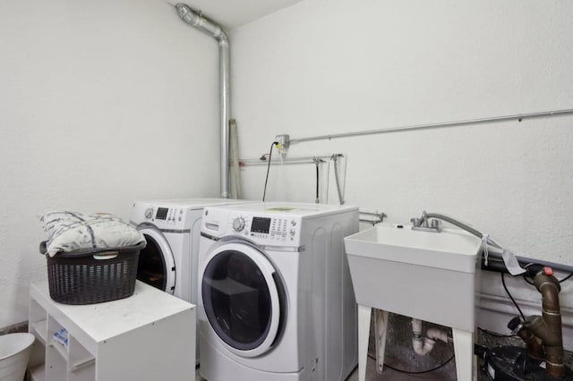 laundry area featuring washing machine and dryer