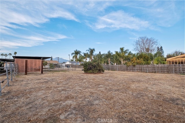 view of yard with an outdoor structure