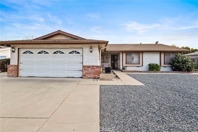 ranch-style home with a garage